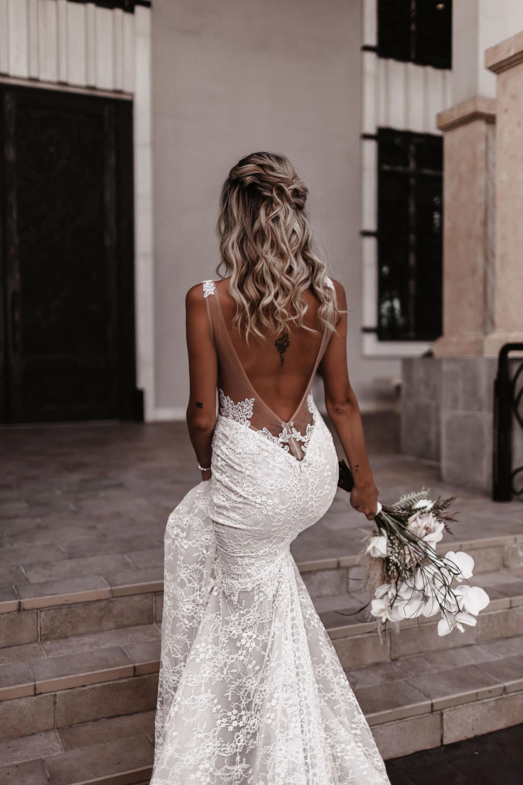 Hair up or down with backless dress?