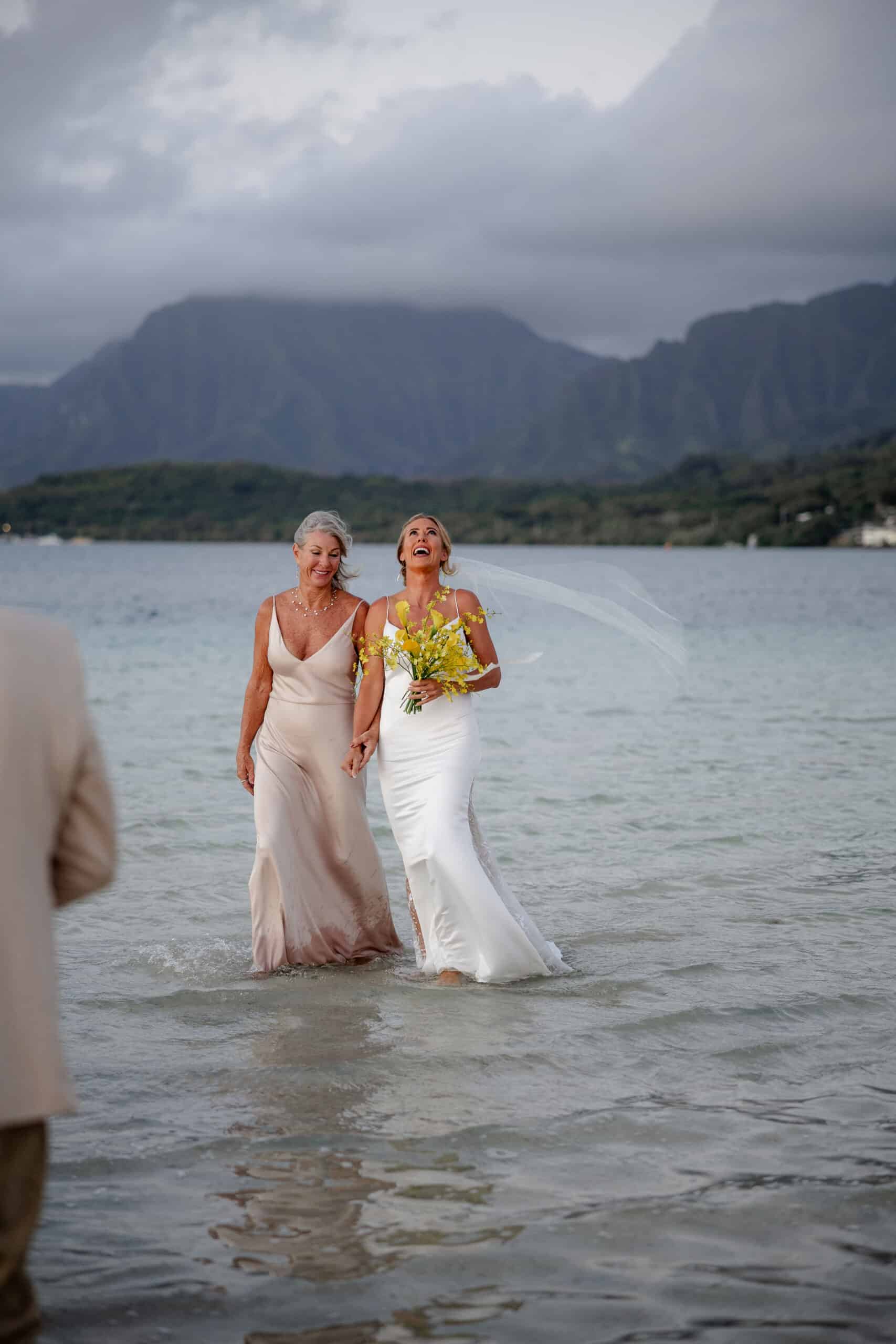 mom walking bride down aisle